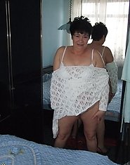 This chubby mama gets horny on her bed